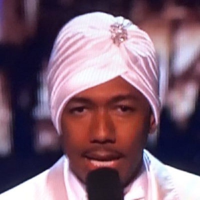 Nick Cannon in a pink turban